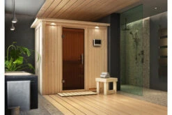 KARIBU Variado Sauna, Naturbelassen, Fichte, 210 X 132 X 202 Cm, Fronteinstieg,mit Graphitfarbener Tür Und Kranz, SET Mit Ofen 4,5 KW Ext. Strg. Easy