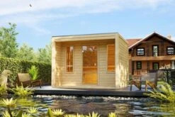 KARIBU Eldor Saunahaus, Naturbelassen, Fichte, 276x276x210 Cm, Mit Bronzierter Tür, Terrasse Und 9 KW Bio-Ofen